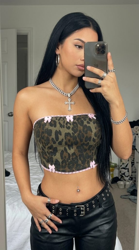 mirror selfie showing leopard top 20261017180139
