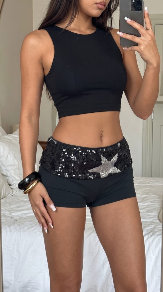 mirror selfie showing shorts 2k 20261023003417