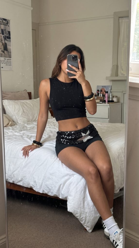 woman taking mirror selfie 2k 20261023003424